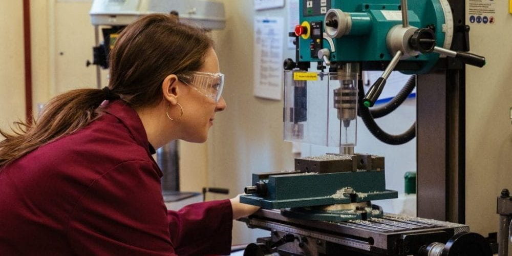 Suzie Collins using lab equipment